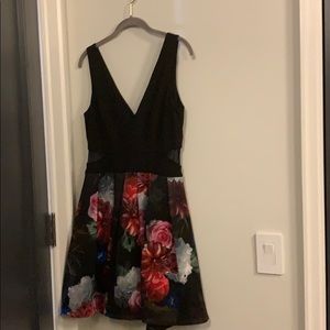 Floral cocktail dress with sheer cut outs